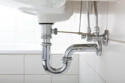 Pipe Under The Sink In The Kitchen Photo