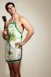 Men in an apron in the kitchen photo