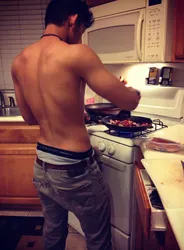 Beautiful men in the kitchen photo