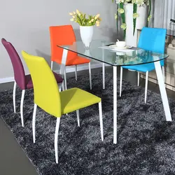 Kitchen with colored chairs photo