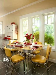 Kitchen with colored chairs photo