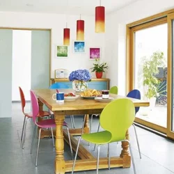Kitchen with colored chairs photo