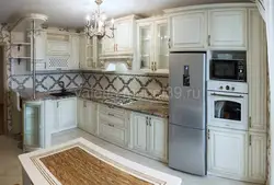 White kitchen with patina photo