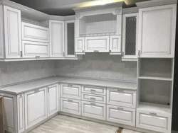 White kitchen with patina photo