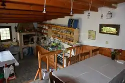 Photo of a garage with a summer kitchen