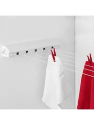 Wall-mounted dryer in the bathroom photo