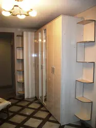 Shelving in a narrow hallway photo
