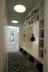 Shelving in a narrow hallway photo