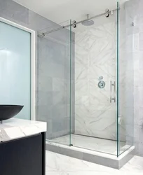 Glass shower in the bathroom photo