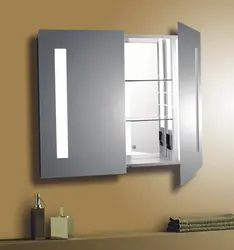 Photo of a wardrobe with a mirror in the bathroom