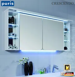 Photo of a wardrobe with a mirror in the bathroom