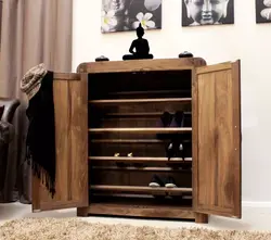 Chest of drawers for shoes in the hallway photo