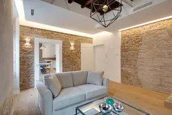 Decorative plaster in the interior of the kitchen living room