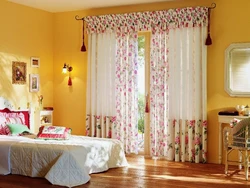 Colored curtains in the bedroom interior photo