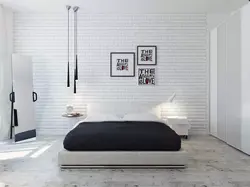 Bedrooms With White Brick Photo