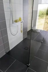 Shower With Drain In Bathroom Photo