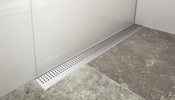 Shower with drain in bathroom photo