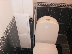 Design of a toilet with a box in an apartment