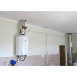 Gas pipe under the ceiling in the kitchen photo