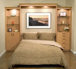 Bedroom with double bed and wardrobe photo