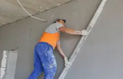 Leveling walls in an apartment photo
