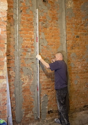 Leveling walls in an apartment photo