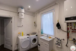 Interior of a combined bathroom with a boiler