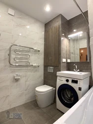 Interior of a combined bathroom with a boiler