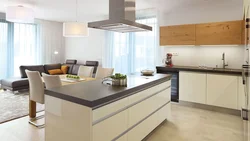 Modern kitchens with an island combined with a living room photo