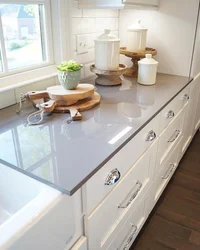 Cabinet by the window in the kitchen photo