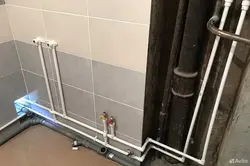 Polypropylene pipes in the bathroom photo