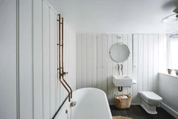 Bathroom interior with pipes