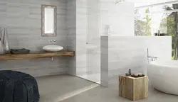 Bathroom design gray porcelain tiles and wood