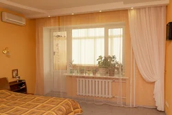 Balcony door in the bedroom interior