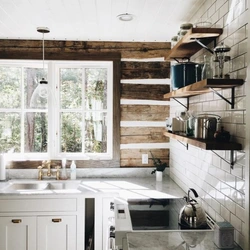 Kitchen in a wooden house with a sink by the window photo