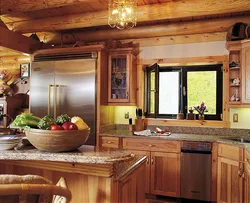 Kitchen in a wooden house with a sink by the window photo