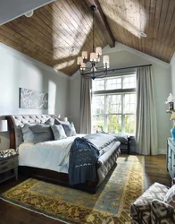 Bedroom design in a house with a wooden ceiling