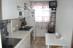 Kitchen design with a window and a gas floor boiler