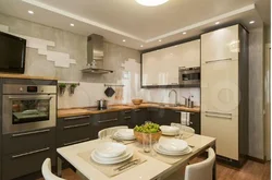 Kitchen design with refrigerator and TV