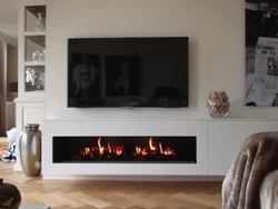 Qonaq otağının interyerində quraşdırılmış biokaminlər