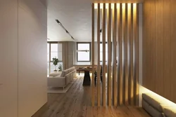 Zoning the living room with slats photo