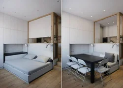 Studio design with bed and sofa and kitchen