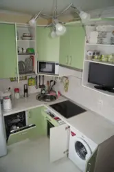 Kitchen In Khrushchev Design With Refrigerator And Dishwasher