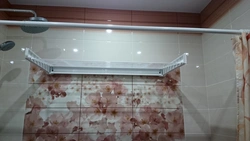 Wall-mounted clothes dryers in the bathroom interior