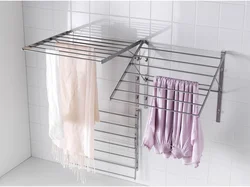 Wall-mounted clothes dryers in the bathroom interior