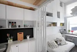 Studio design 20 sq m with kitchen and bedroom