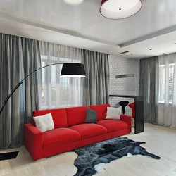 Bedroom with gray sofa photo