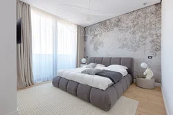 Bedroom with gray sofa photo