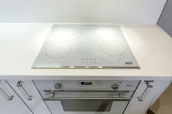 Cooktop and cabinet photo in the kitchen