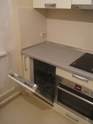 Cooktop and cabinet photo in the kitchen